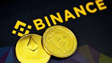 Natpis Binance i kovanice kriptovaluta